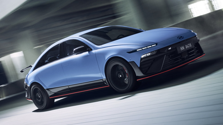 Front right view of blue Hyundai Ioniq 6 N in motion