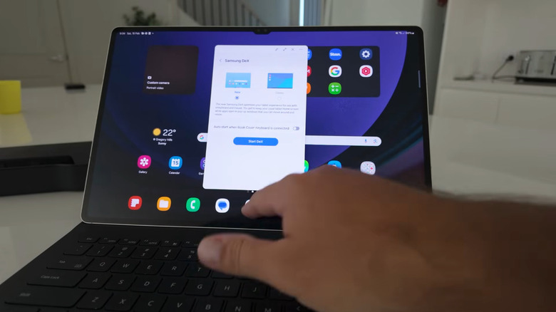 A person using Samsung Dex on a tablet
