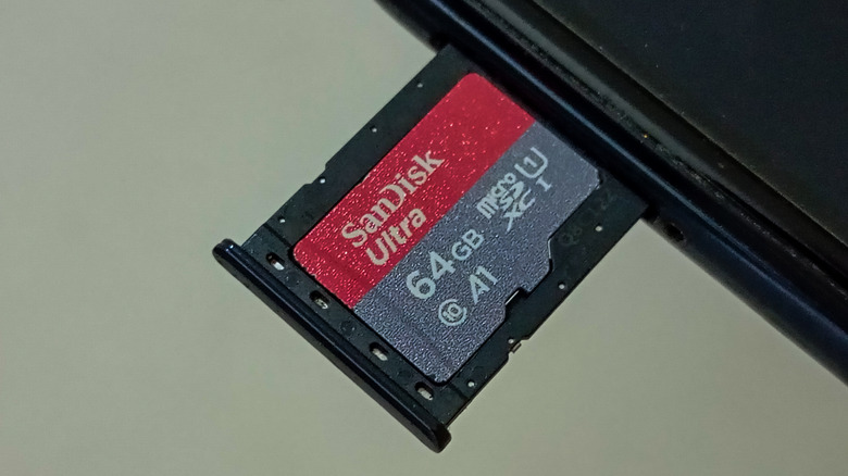 A microSD card in a microSD card slot on a device