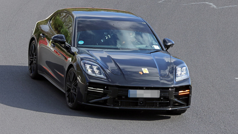 Porsche Panamera prototype undergoing testing, front 3/4 view