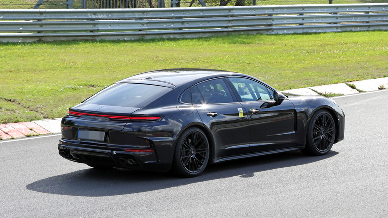 Porsche Panamera prototype undergoing testing, rear 3/4 view