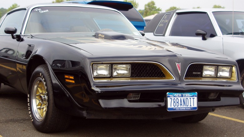 A 1978 Pontiac Trans Am matching the design used in the Smokey and the Bandit movie franchise.