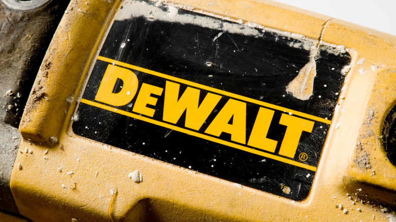 The DeWalt logo on a tool.