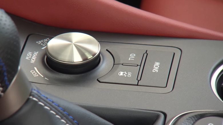 The Snow button on a Lexus sedan