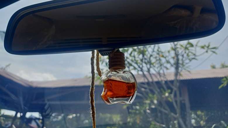 air freshener hanging on rearview mirror