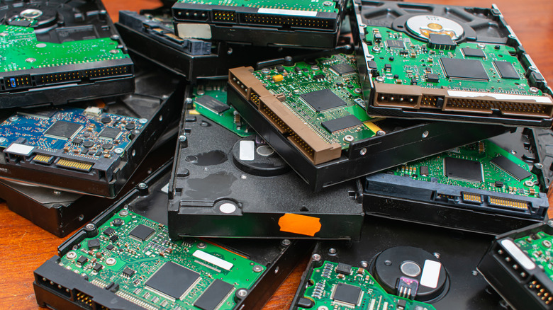 Old HDD internal drives in a pile