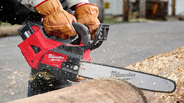 The Milwaukee chainsaw in action