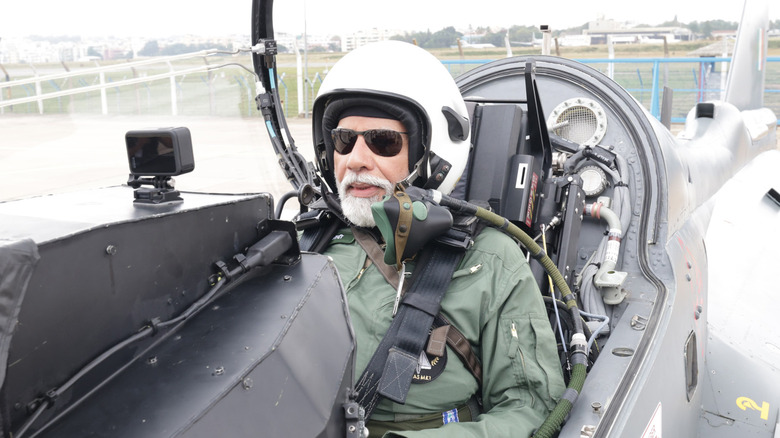 Indian Prime Minister Modi prepares to take off in a Tejas fighter jet in November 2023.