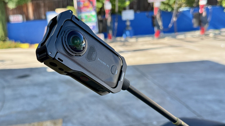 Insta360 X6 mounted to a selfie stick on a Yamaha XSR900