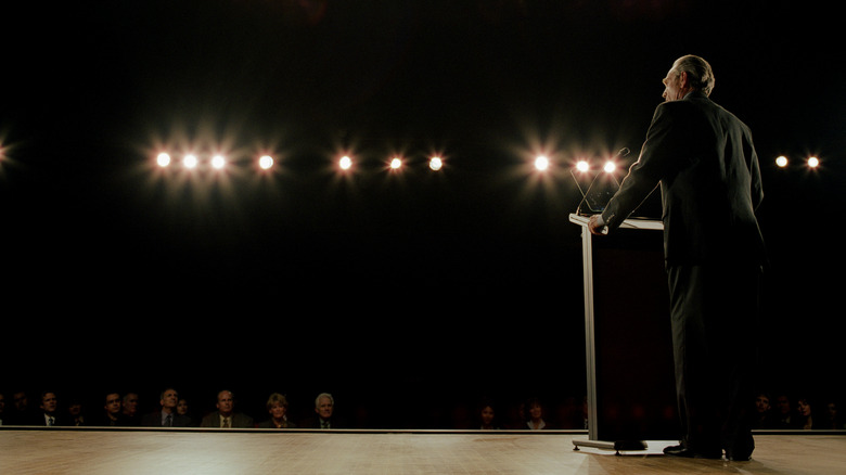 Politician giving speech at podium