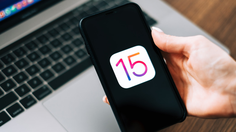 iOS 15 logo on an iPhone