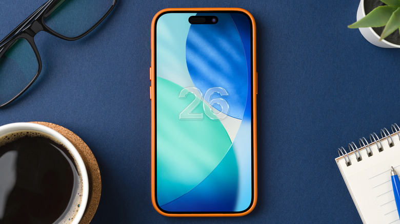 iOS 26 wallpaper and text on an iPhone
