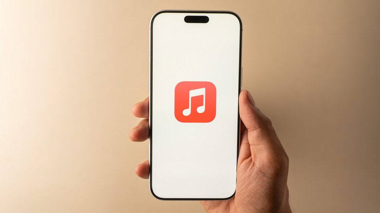 Apple Music splash screen on a smartphone screen