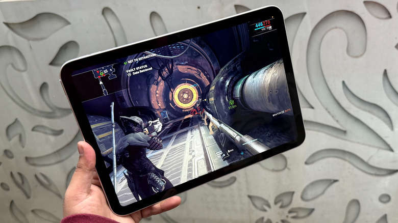 Playing game on the iPad.