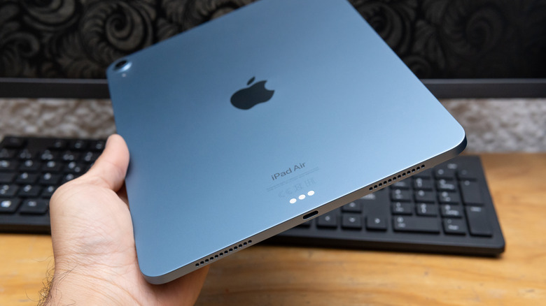 holding ipad