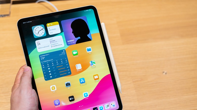 person holding iPad