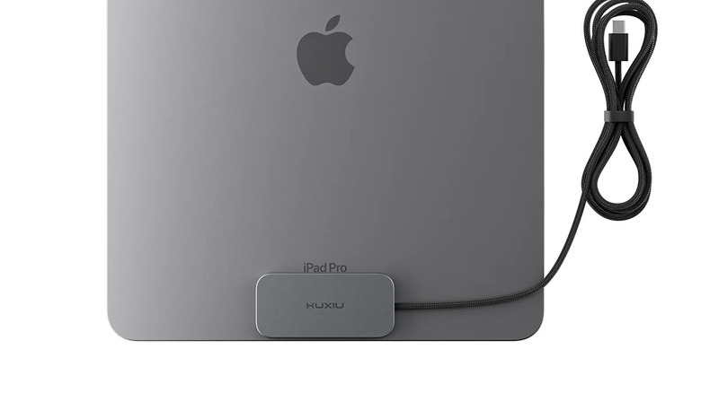 Kuxiu Magnetic Smart Connector Charger connected to an iPad Pro