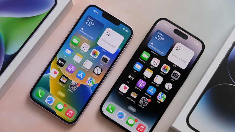 two iPhone 14 devices screens on