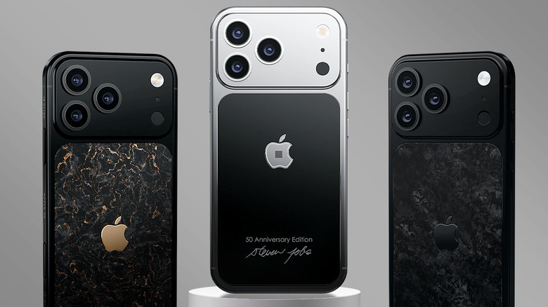 Three Caviar 50th anniversary edition iPhones in a row, with the black turtleneck model in center
