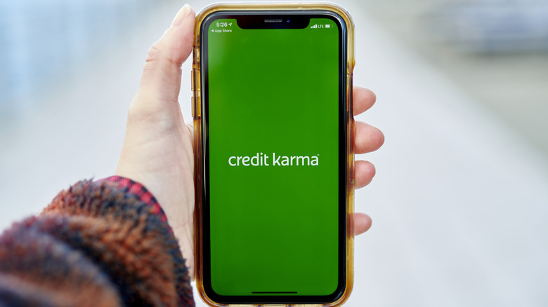 Phone displaying Credit Karma logo