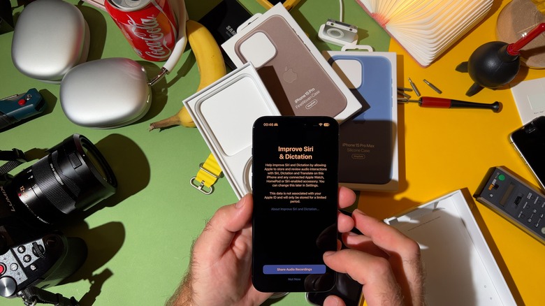 Someone setting up Siri on their iPhone