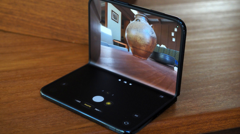 iPhone Duo camera UI with phone part-folded