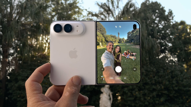 A person taking a selfie with the iPhone Duo's ultrawide camera