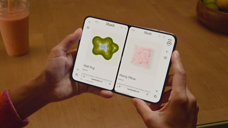 A person using split screen apps on the iPhone Duo