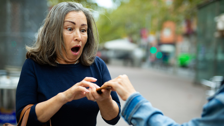 Victim in street phone robbery