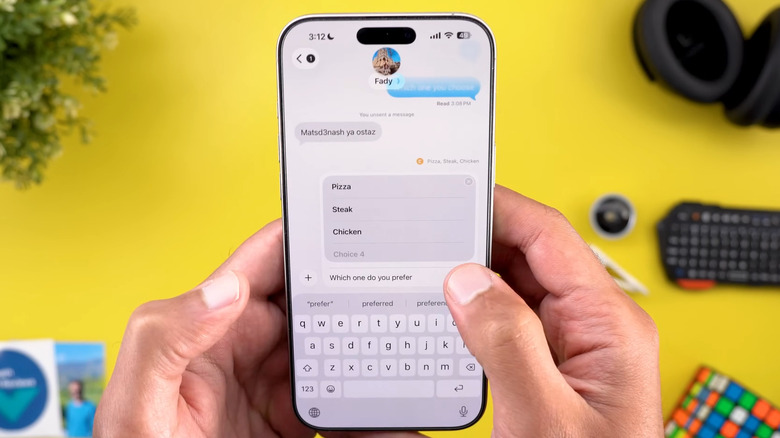 iPhone in hands showing Messages app poll feature