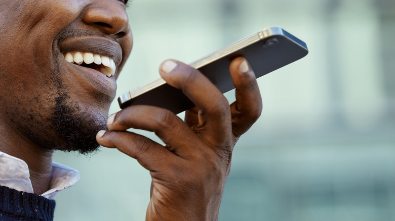 Man speaking into phone