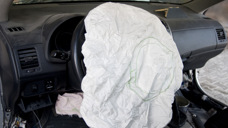 Deployed and deflated airbag