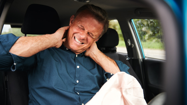 Man with neck pain after airbag deployed