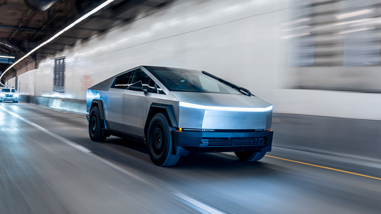 Cybertruck speeding down a tunnel roadway