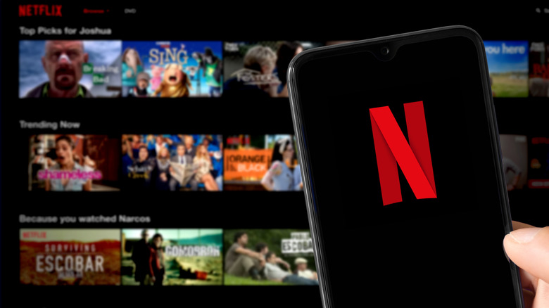 Netflix logo with Netflix catalog in background