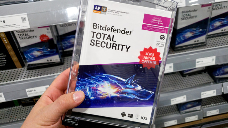 A Bitdefender Total Security product box.
