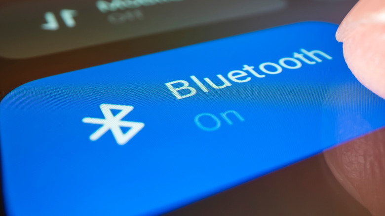 Close-up view of turning on Bluetooth on a smartphone