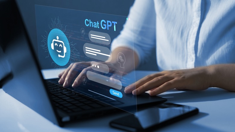 person using ChatGPT on computer