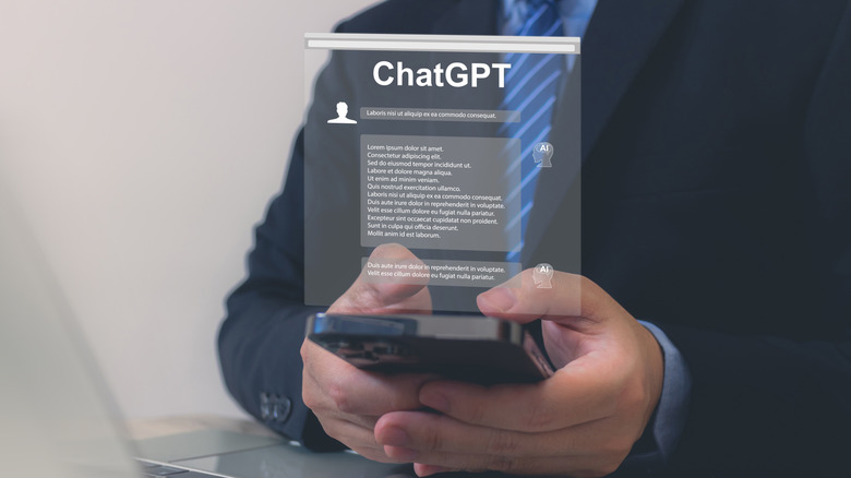Businessperson using ChatGPT on smartphone
