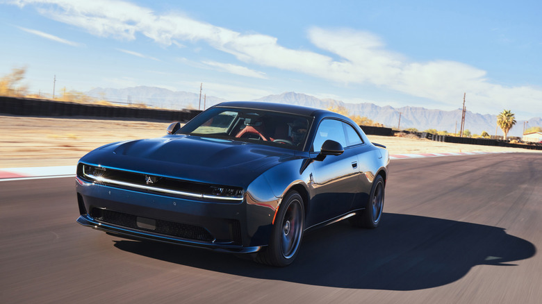 2025 Dodge Charger Daytona Scat Pack driving on race track