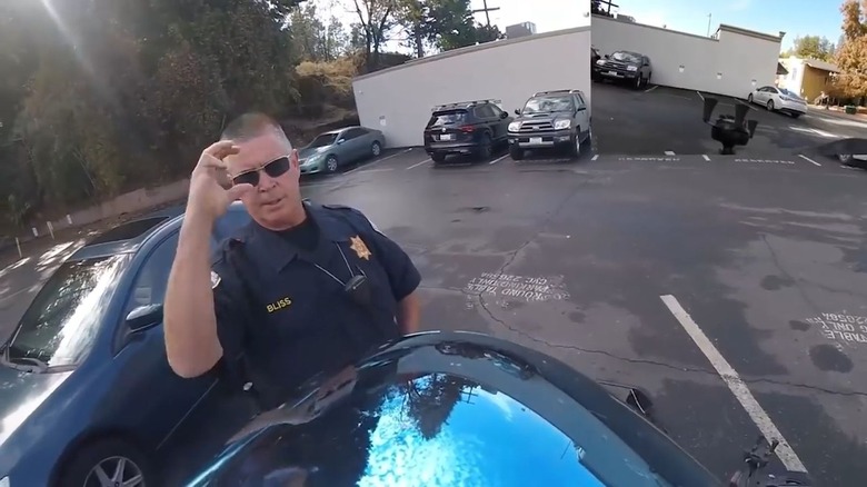 A motorcyclist is pulled over by CHP for having a GoPro on his helmet.
