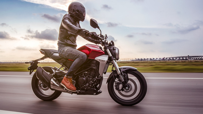 person riding honda cb300r