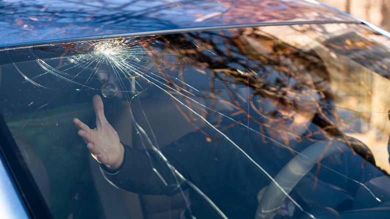 Broken windshield on car