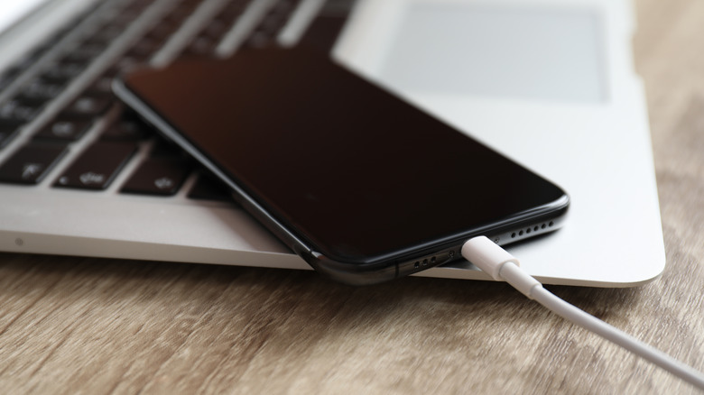 iphone charging on macbook
