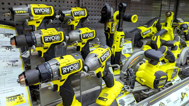 A display of Ryobi power tools in a hardware store