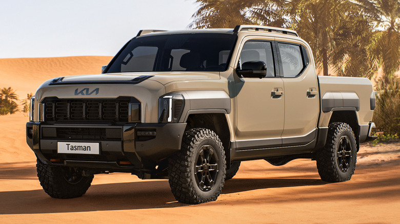 Kia Tasman pickup truck parked in desert
