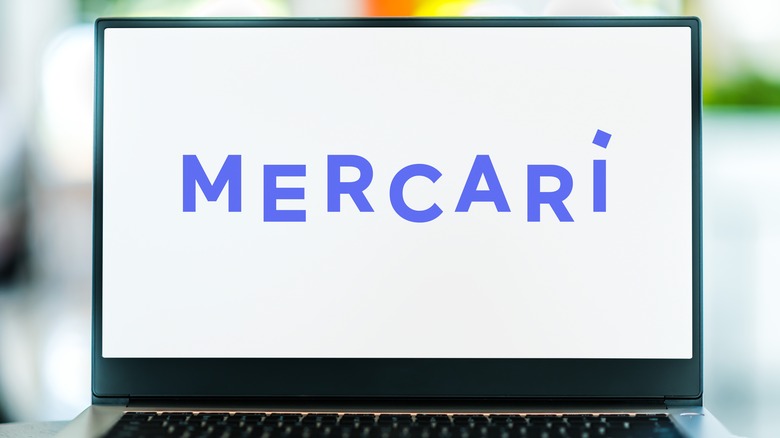 Mercari logo on laptop