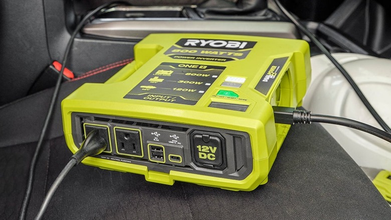 Ryobi 800-Watt Power Inverter sitting on car passenger seat