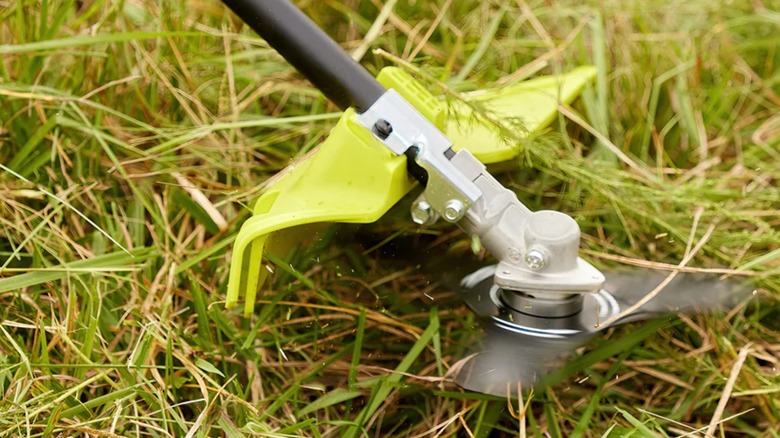 Ryobi Brush Cutter Attachment on grass