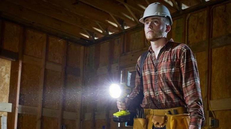 Construction worker holding Spotlight